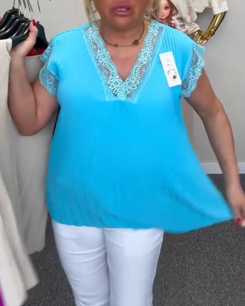 Elegant solid color sleeveless V-neck lace blouse